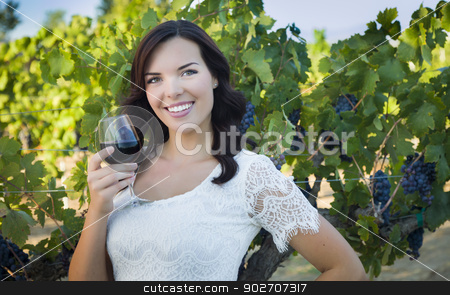 To use this stock image in your creative project, please select the size you need over to the right and click the "Add to Cart" button.
Your downloaded image will come with the Cutcaster watermark removed so don’t worry about the watermark you see on this page. Young Adult Woman Enjoying A Glass of Wine in Vineyard stock photo, Pretty Mixed Race Young Adult Woman Enjoying A Glass of Wine in the Vineyard. by Andy Dean