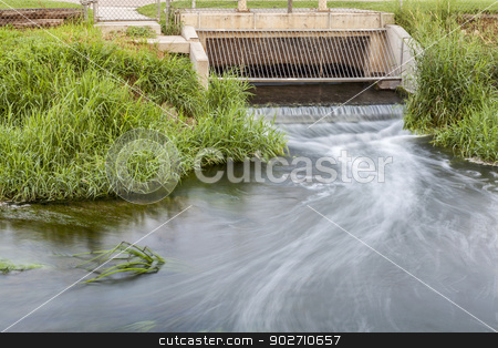To use this stock image in your creative project, please select the size you need over to the right and click the "Add to Cart" button.
Your downloaded image will come with the Cutcaster watermark removed so don’t worry about the watermark you see on this page. cleaned sewage flowing stock photo, Processed and cleaned sewage flowing out from water reclamation facility to a river by Marek Uliasz