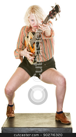 To use this stock image in your creative project, please select the size you need over to the right and click the "Add to Cart" button.
Your downloaded image will come with the Cutcaster watermark removed so don’t worry about the watermark you see on this page. Frowning Guitar Player stock photo, Frowning guitar player dancing and performing on white by Scott Griessel