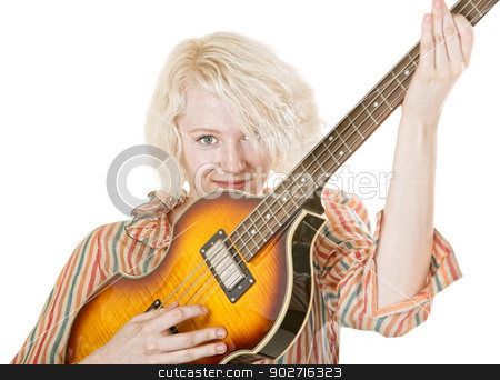 To use this stock image in your creative project, please select the size you need over to the right and click the "Add to Cart" button.
Your downloaded image will come with the Cutcaster watermark removed so don’t worry about the watermark you see on this page. Grinning Female Guitarist stock photo, Grinning young lady electric guitarist on isolated background by Scott Griessel