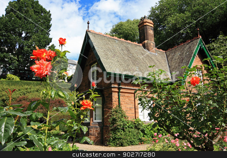 To use this stock image in your creative project, please select the size you need over to the right and click the "Add to Cart" button.
Your downloaded image will come with the Cutcaster watermark removed so don’t worry about the watermark you see on this page. Little house with roses stock photo, Little house with roses in the garden by Juliet Photography