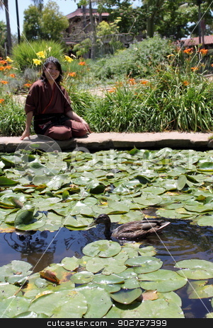 To use this stock image in your creative project, please select the size you need over to the right and click the "Add to Cart" button.
Your downloaded image will come with the Cutcaster watermark removed so don’t worry about the watermark you see on this page. Japanese Women stock photo, Portrait of a Japanese woman sitting at the water edge watching a dug. by Henrik Lehnerer