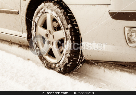 To use this stock image in your creative project, please select the size you need over to the right and click the "Add to Cart" button.
Your downloaded image will come with the Cutcaster watermark removed so don’t worry about the watermark you see on this page. Winter tyre stock photo, Close up of a cars tires on a snowy road - sepia tone by Nneirda