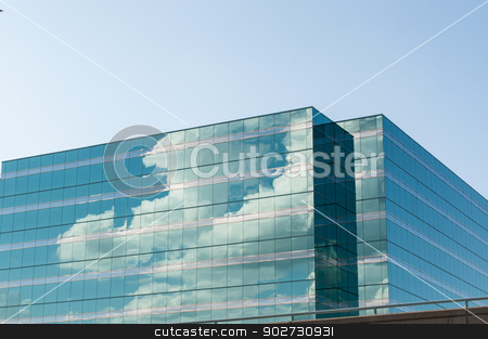 To use this stock image in your creative project, please select the size you need over to the right and click the "Add to Cart" button.
Your downloaded image will come with the Cutcaster watermark removed so don’t worry about the watermark you see on this page. Modern Office Building Reflecting the Clouds stock photo, A modern reflective office building reflects the white clouds in a blue sky. by Brian Guest