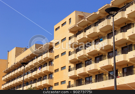 To use this stock image in your creative project, please select the size you need over to the right and click the "Add to Cart" button.
Your downloaded image will come with the Cutcaster watermark removed so don’t worry about the watermark you see on this page. Generic tourist hotels stock photo, Exterior of old generic tourist hotels with blue sky background. by Martin Crowdy