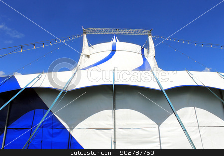 To use this stock image in your creative project, please select the size you need over to the right and click the "Add to Cart" button.
Your downloaded image will come with the Cutcaster watermark removed so don’t worry about the watermark you see on this page. Low angle view of circus big top tent stock photo, Low angle view of circus big top tent, blue sky background. by Martin Crowdy