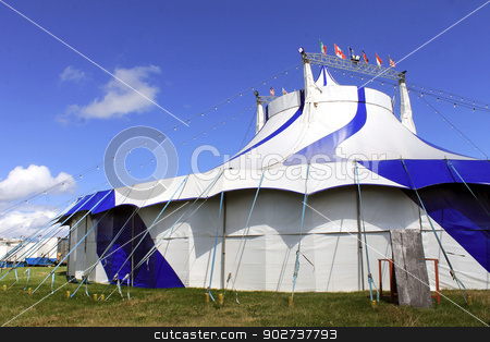 To use this stock image in your creative project, please select the size you need over to the right and click the "Add to Cart" button.
Your downloaded image will come with the Cutcaster watermark removed so don’t worry about the watermark you see on this page. Striped circus big top tent stock photo, Scenic view of striped circus big top tent. by Martin Crowdy