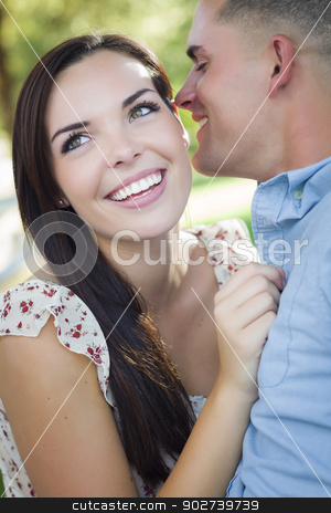 To use this stock image in your creative project, please select the size you need over to the right and click the "Add to Cart" button.
Your downloaded image will come with the Cutcaster watermark removed so don’t worry about the watermark you see on this page. Mixed Race Romantic Couple Whispering in the Park stock photo, Happy Mixed Race Romantic Couple Whispering in the Park. by Andy Dean