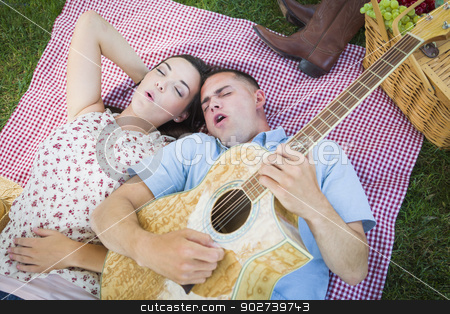 To use this stock image in your creative project, please select the size you need over to the right and click the "Add to Cart" button.
Your downloaded image will come with the Cutcaster watermark removed so don’t worry about the watermark you see on this page. Mixed Race Couple at the Park Playing Guitar and Singing stock photo, Happy Mixed Race Couple On Picnic Blanket at the Park Playing Guitar and Singing Songs. by Andy Dean