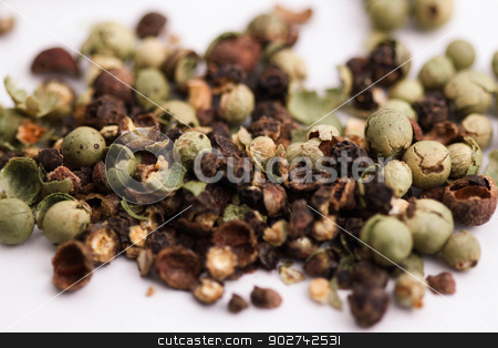 To use this stock image in your creative project, please select the size you need over to the right and click the "Add to Cart" button.
Your downloaded image will come with the Cutcaster watermark removed so don’t worry about the watermark you see on this page. Pepper stock photo, Close-up of green brown black pepper corns on white background. by Henrik Lehnerer