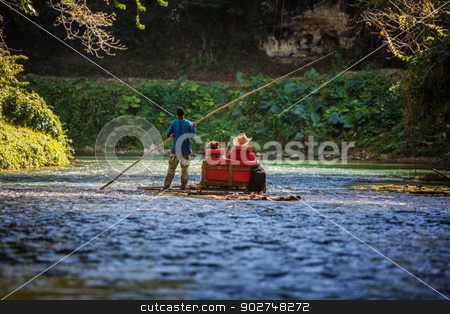 To use this stock image in your creative project, please select the size you need over to the right and click the "Add to Cart" button.
Your downloaded image will come with the Cutcaster watermark removed so don’t worry about the watermark you see on this page. Tourists on Martha Brae River in Jamaica stock photo, River Boat with tourists on Martha Brae River in Jamaica by Scott Griessel