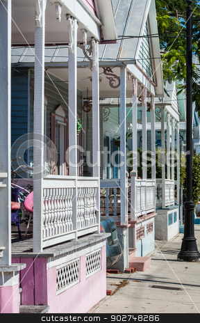 To use this stock image in your creative project, please select the size you need over to the right and click the "Add to Cart" button.
Your downloaded image will come with the Cutcaster watermark removed so don’t worry about the watermark you see on this page. Home detail in Key West stock photo, Detail of colorful homes in Key West, Florida by Scott Griessel