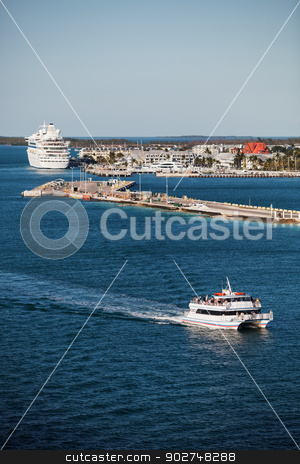 To use this stock image in your creative project, please select the size you need over to the right and click the "Add to Cart" button.
Your downloaded image will come with the Cutcaster watermark removed so don’t worry about the watermark you see on this page. Key West Port With Boats stock photo, Key West port with cruise ship and tourist catmaran boat by Scott Griessel