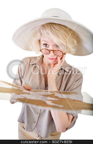 To use this stock image in your creative project, please select the size you need over to the right and click the "Add to Cart" button.
Your downloaded image will come with the Cutcaster watermark removed so don’t worry about the watermark you see on this page. Confused Blond Woman with Map stock photo, Confused blond woman in safari clothes with map by Scott Griessel
