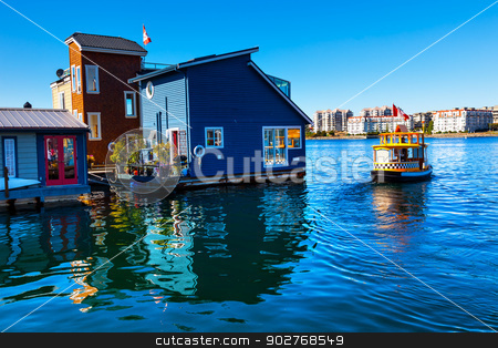 To use this stock image in your creative project, please select the size you need over to the right and click the "Add to Cart" button.
Your downloaded image will come with the Cutcaster watermark removed so don’t worry about the watermark you see on this page. Floating Home Village Water Taxi Blue Houseboats Fisherman's Wha stock photo, Floating Home Village Blue Houseboats Water Taxi Fisherman's Wharf Reflection Inner Harbor, Victoria Vancouver British Columbia Canada Pacific Northwest. Close to the center of Victoria, this area has floating homes, boats, piers, and restuarants. by William Perry