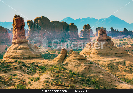 To use this stock image in your creative project, please select the size you need over to the right and click the "Add to Cart" button.
Your downloaded image will come with the Cutcaster watermark removed so don’t worry about the watermark you see on this page. Petrified Sand Dunes Garden of Eden La Salle Mountains Arches Na stock photo, Petrified Sand Dunes Garden of Eden Windows Section La Salle Mountains Arches National Park Moab Utah USA Southwest. Classic sandstone hoodoos in Arches National Park. by William Perry