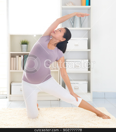 To use this stock image in your creative project, please select the size you need over to the right and click the "Add to Cart" button.
Your downloaded image will come with the Cutcaster watermark removed so don’t worry about the watermark you see on this page. Relaxation yoga stock photo, Pregnancy yoga meditation. Full length healthy 8 months pregnant calm Asian woman meditating or doing yoga exercise at home. Relaxation yoga kneeling side stretch positions. by szefei