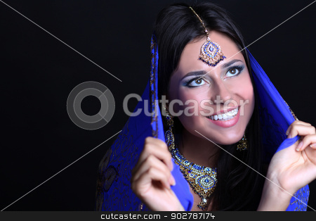 To use this stock image in your creative project, please select the size you need over to the right and click the "Add to Cart" button.
Your downloaded image will come with the Cutcaster watermark removed so don’t worry about the watermark you see on this page. Beautiful Brunette Woman stock photo, Closeup portrait of beautiful female wearing traditional indian by andersonrise
