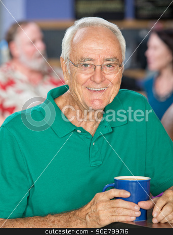 To use this stock image in your creative project, please select the size you need over to the right and click the "Add to Cart" button.
Your downloaded image will come with the Cutcaster watermark removed so don’t worry about the watermark you see on this page. Cheerful Handsome Man stock photo, Handsome senior male smiling with coffee mug by Scott Griessel