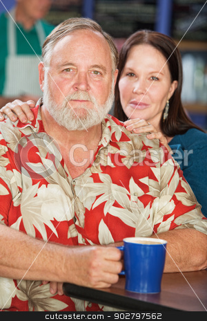 To use this stock image in your creative project, please select the size you need over to the right and click the "Add to Cart" button.
Your downloaded image will come with the Cutcaster watermark removed so don’t worry about the watermark you see on this page. Attractive Couple in Cafe stock photo, Attractive middle aged couple with coffee in cafe by Scott Griessel