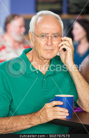 To use this stock image in your creative project, please select the size you need over to the right and click the "Add to Cart" button.
Your downloaded image will come with the Cutcaster watermark removed so don’t worry about the watermark you see on this page. Serious Man with Coffee stock photo, Thoughtful single senior male with coffee mug by Scott Griessel