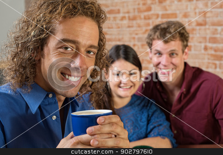 To use this stock image in your creative project, please select the size you need over to the right and click the "Add to Cart" button.
Your downloaded image will come with the Cutcaster watermark removed so don’t worry about the watermark you see on this page. Smiling Man with Coffee stock photo, Smiling man with coffee and friends sitting together by Scott Griessel