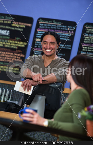 To use this stock image in your creative project, please select the size you need over to the right and click the "Add to Cart" button.
Your downloaded image will come with the Cutcaster watermark removed so don’t worry about the watermark you see on this page. Handsome Restaurant Waiter stock photo, Handsome Latino waiter behind counter at restaurant by Scott Griessel
