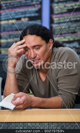 To use this stock image in your creative project, please select the size you need over to the right and click the "Add to Cart" button.
Your downloaded image will come with the Cutcaster watermark removed so don’t worry about the watermark you see on this page. Tired Cafe Worker stock photo, Stressed out male restaurant worker at counter by Scott Griessel