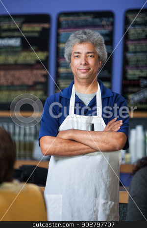 To use this stock image in your creative project, please select the size you need over to the right and click the "Add to Cart" button.
Your downloaded image will come with the Cutcaster watermark removed so don’t worry about the watermark you see on this page. Attractive Cafe Waiter stock photo, Confident mature Arab cafe waiter with apron by Scott Griessel