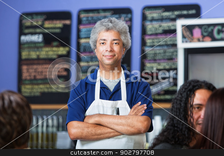 To use this stock image in your creative project, please select the size you need over to the right and click the "Add to Cart" button.
Your downloaded image will come with the Cutcaster watermark removed so don’t worry about the watermark you see on this page. Confident Cafe Owner stock photo, Man with folded arms standing in a coffee house by Scott Griessel