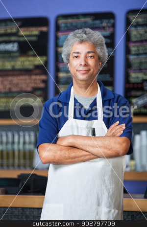 To use this stock image in your creative project, please select the size you need over to the right and click the "Add to Cart" button.
Your downloaded image will come with the Cutcaster watermark removed so don’t worry about the watermark you see on this page. Man in Apron with Folded Arms stock photo, Confident mature Black cafe owner in apron by Scott Griessel