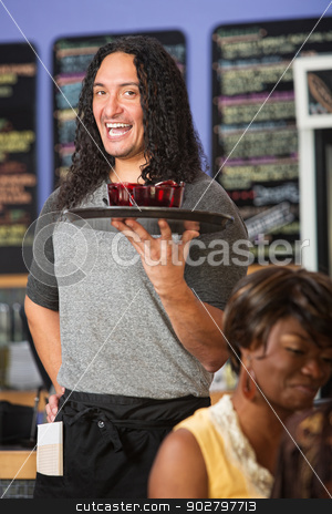 To use this stock image in your creative project, please select the size you need over to the right and click the "Add to Cart" button.
Your downloaded image will come with the Cutcaster watermark removed so don’t worry about the watermark you see on this page. Cheerful Restaurant Owner stock photo, Happy Native American cafe owner serving drinks to customers by Scott Griessel