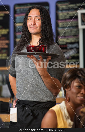 To use this stock image in your creative project, please select the size you need over to the right and click the "Add to Cart" button.
Your downloaded image will come with the Cutcaster watermark removed so don’t worry about the watermark you see on this page. Confident Cafe Owner stock photo, Male Hispanic cafe waiter serving drinks to customers by Scott Griessel