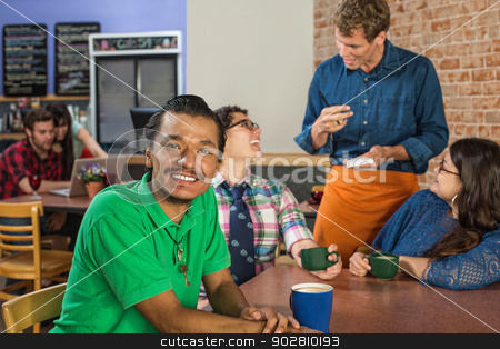 To use this stock image in your creative project, please select the size you need over to the right and click the "Add to Cart" button.
Your downloaded image will come with the Cutcaster watermark removed so don’t worry about the watermark you see on this page. Smiling Man with Friends and Barista stock photo, Grinning Asian man with friends and barista by Scott Griessel