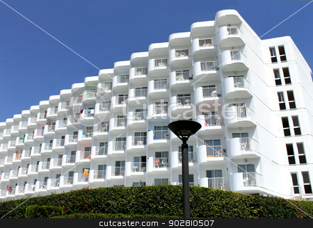 To use this stock image in your creative project, please select the size you need over to the right and click the "Add to Cart" button.
Your downloaded image will come with the Cutcaster watermark removed so don’t worry about the watermark you see on this page. Holiday or vacation hotel stock photo, Holiday or vacation hotel with blue sky background. by Martin Crowdy