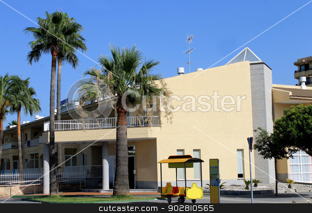 To use this stock image in your creative project, please select the size you need over to the right and click the "Add to Cart" button.
Your downloaded image will come with the Cutcaster watermark removed so don’t worry about the watermark you see on this page. Tourist hotel complex stock photo, Tourist hotel complex on island of Majorca with bus stop in foreground, Spain. by Martin Crowdy