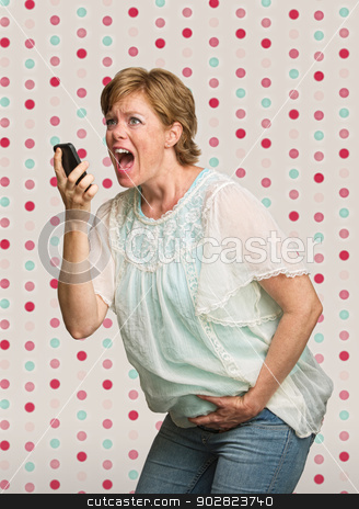 To use this stock image in your creative project, please select the size you need over to the right and click the "Add to Cart" button.
Your downloaded image will come with the Cutcaster watermark removed so don’t worry about the watermark you see on this page. Pregnant Woman in Pain stock photo, Pretty young pregnant woman on polka dot background by Scott Griessel