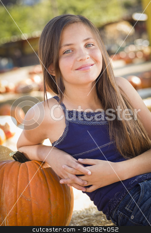 To use this stock image in your creative project, please select the size you need over to the right and click the "Add to Cart" button.
Your downloaded image will come with the Cutcaster watermark removed so don’t worry about the watermark you see on this page. Preteen Girl Portrait at the Pumpkin Patch stock photo, Preteen Girl Portrait at the Pumpkin Patch in a Rustic Setting. by Andy Dean