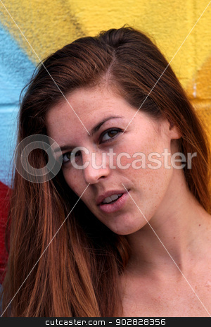 To use this stock image in your creative project, please select the size you need over to the right and click the "Add to Cart" button.
Your downloaded image will come with the Cutcaster watermark removed so don’t worry about the watermark you see on this page. Young Woman stock photo, Young WomanYoung woman standing in front of a colorful background. by Henrik Lehnerer