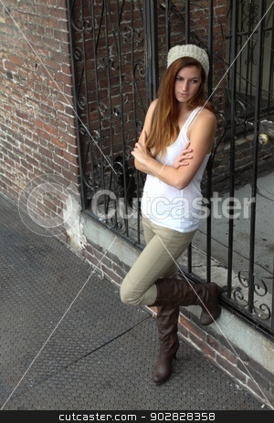 To use this stock image in your creative project, please select the size you need over to the right and click the "Add to Cart" button.
Your downloaded image will come with the Cutcaster watermark removed so don’t worry about the watermark you see on this page. Portrait Of A Woman stock photo, Portrait Of A WomanPortrait of a woman standing in front of a gate. by Henrik Lehnerer