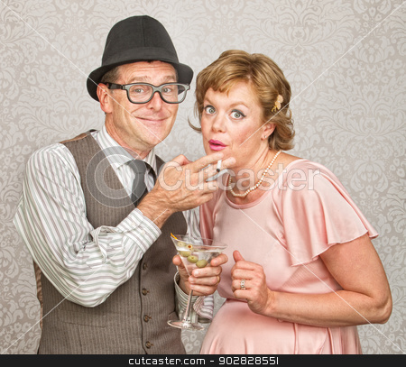 To use this stock image in your creative project, please select the size you need over to the right and click the "Add to Cart" button.
Your downloaded image will come with the Cutcaster watermark removed so don’t worry about the watermark you see on this page. Pregnant Couple Smoking and Drinking stock photo, Expecting couple smoking cigarettes and drinking alcohol by Scott Griessel