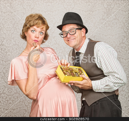 To use this stock image in your creative project, please select the size you need over to the right and click the "Add to Cart" button.
Your downloaded image will come with the Cutcaster watermark removed so don’t worry about the watermark you see on this page. Pregnant Woman with Gift of Candy stock photo, Businessman with gift of chocolate for pregnant woman by Scott Griessel