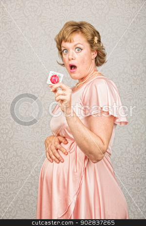 To use this stock image in your creative project, please select the size you need over to the right and click the "Add to Cart" button.
Your downloaded image will come with the Cutcaster watermark removed so don’t worry about the watermark you see on this page. Surprised Pregnant Woman stock photo, One surprised pregnant female holding a contraceptive by Scott Griessel