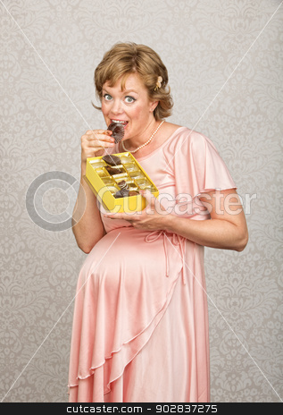 To use this stock image in your creative project, please select the size you need over to the right and click the "Add to Cart" button.
Your downloaded image will come with the Cutcaster watermark removed so don’t worry about the watermark you see on this page. Expecting Lady Eating Candy stock photo, Single white pregnant female licking chocolate wrappers by Scott Griessel