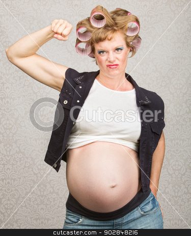 To use this stock image in your creative project, please select the size you need over to the right and click the "Add to Cart" button.
Your downloaded image will come with the Cutcaster watermark removed so don’t worry about the watermark you see on this page. Pregnant Lady Flexing Muscles stock photo, Young pregnant woman in curlers flexing her biceps by Scott Griessel