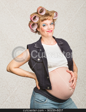 To use this stock image in your creative project, please select the size you need over to the right and click the "Add to Cart" button.
Your downloaded image will come with the Cutcaster watermark removed so don’t worry about the watermark you see on this page. Grinning Pregnant Hillbilly stock photo, Young pregnant single female hillbilly with smile by Scott Griessel