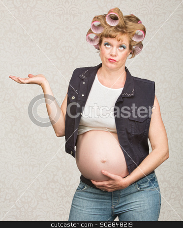 To use this stock image in your creative project, please select the size you need over to the right and click the "Add to Cart" button.
Your downloaded image will come with the Cutcaster watermark removed so don’t worry about the watermark you see on this page. Indifferent Pregnant Woman stock photo, Indifferent pregnant single female in curlers with hand up by Scott Griessel