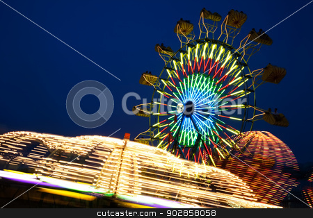 To use this stock image in your creative project, please select the size you need over to the right and click the "Add to Cart" button.
Your downloaded image will come with the Cutcaster watermark removed so don’t worry about the watermark you see on this page. County Fair stock photo, Amusement Rides with Movement Blur in the evening at the Kentucky State Fair Midway Louisville Kentucky by David Davis