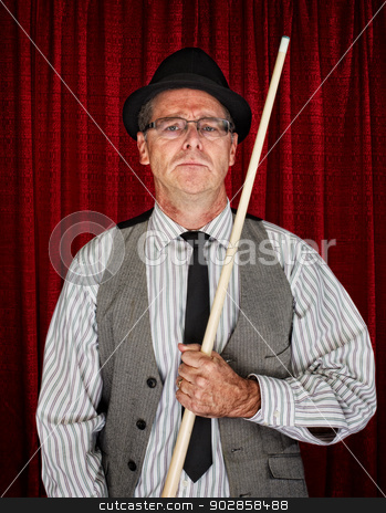 To use this stock image in your creative project, please select the size you need over to the right and click the "Add to Cart" button.
Your downloaded image will come with the Cutcaster watermark removed so don’t worry about the watermark you see on this page. Pool Player in Pinstripe stock photo, Serious retro style man with pool cue on curtain background by Scott Griessel