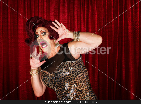 To use this stock image in your creative project, please select the size you need over to the right and click the "Add to Cart" button.
Your downloaded image will come with the Cutcaster watermark removed so don’t worry about the watermark you see on this page. Frightened Man in Drag stock photo, Frightened man in drag queen in theater by Scott Griessel
